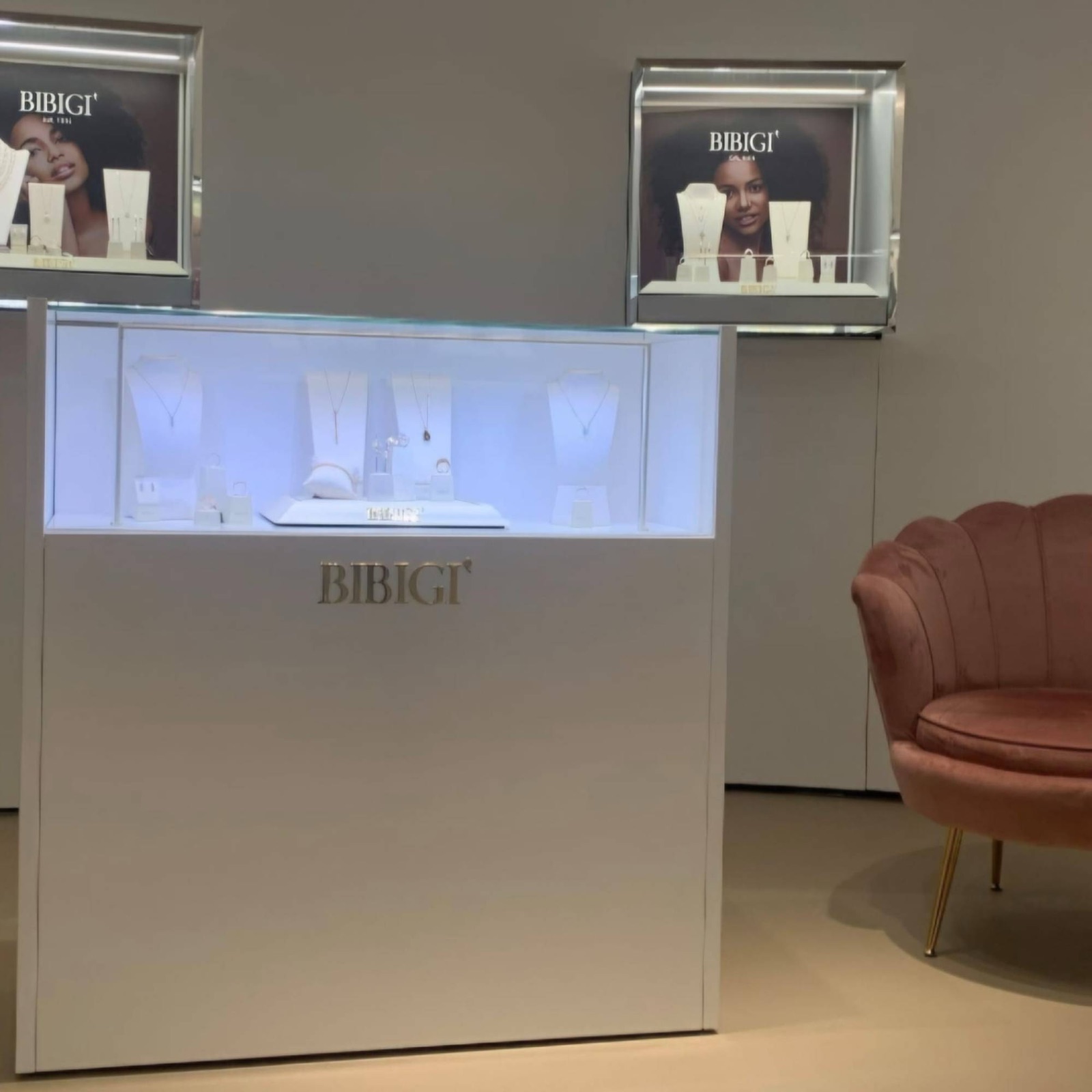 Illuminated jewellery showcase and wall display cases in a boutique